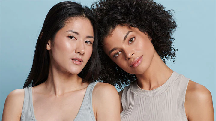 Two women with healthy, glowing skin